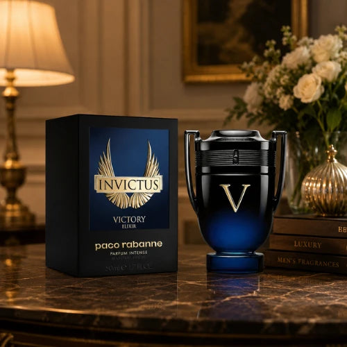 Paco Rabanne Invictus Victory Elixir 100ml trophy bottle beside its blue box