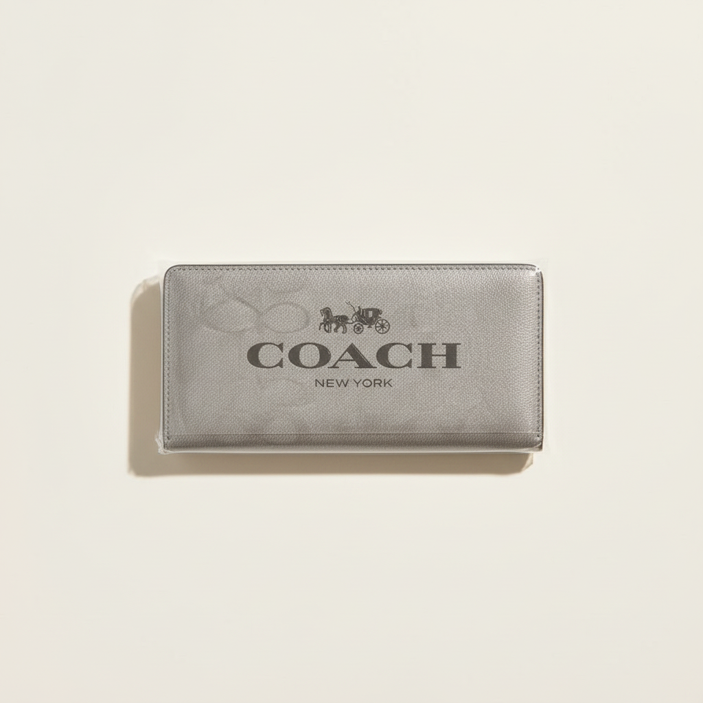 Light silver-gray Coach signature zip wallet
