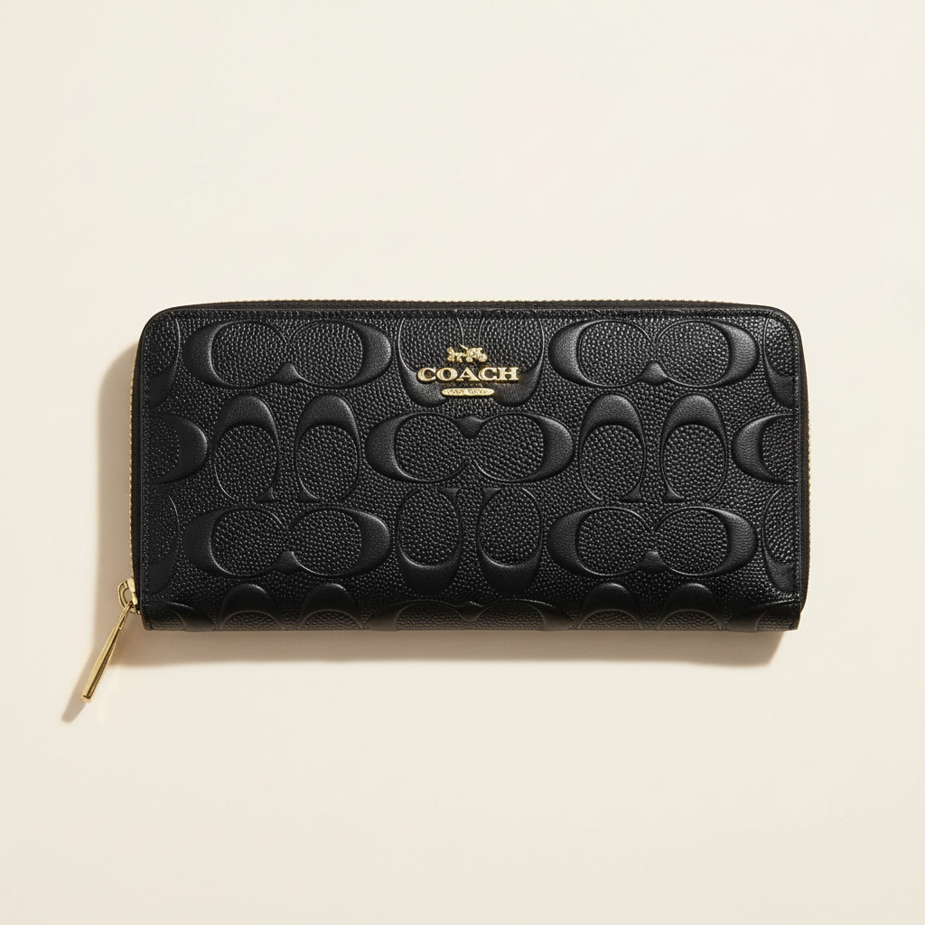 Black Coach long wallet with tonal raised signature pattern
