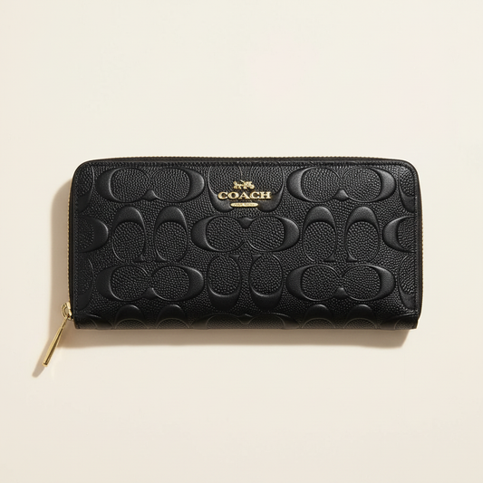 Black Coach long wallet with tonal raised signature pattern