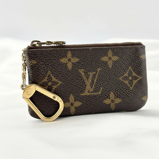 Brown Louis Vuitton monogram mini pouch with gold clasp and chain