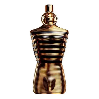 Gold ribbed sculpted Eau de Parfum bottle on a white background